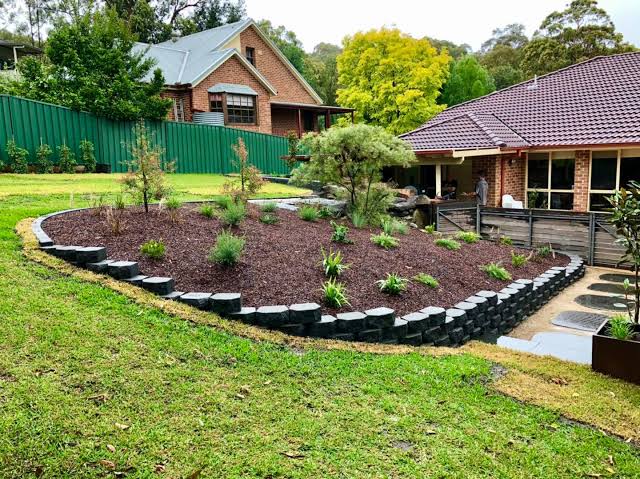 What Is the Best Retaining Wall Design for a Backyard Slope